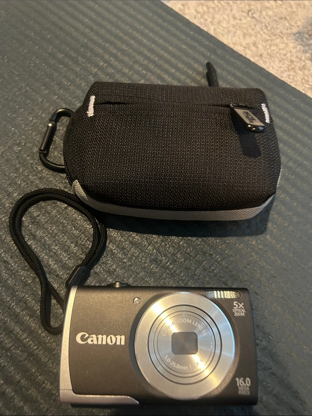 Canon Compact Digital Camera in Black and Silver with Wrist Strap and Case